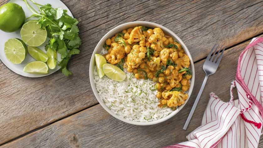 vegetarian curry cauliflower buddha rice bowl